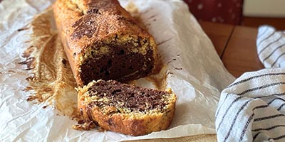 Plumcake con farina di farro, zucca, cacao e arance